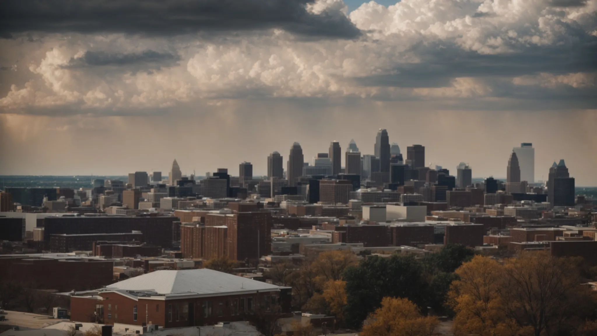 a skyline view of kansas city with a focus on clear skies following a storm, symbolizing the renewal and recovery brought by water damage restoration services.